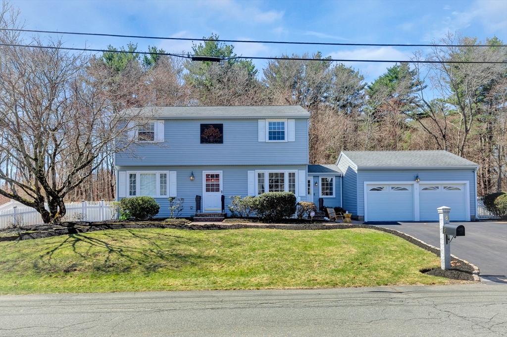 6 Blueberry Hill Road Groveland, MA 01834 - Photo 4 of 39 a front view of a house with a yard
