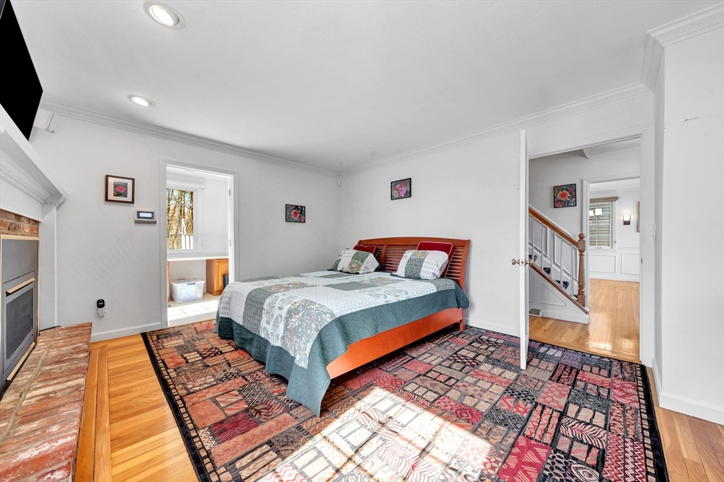 6 Blueberry Hill Road Groveland, MA 01834 - Photo 7 of 39 a bedroom with bed and wooden floor