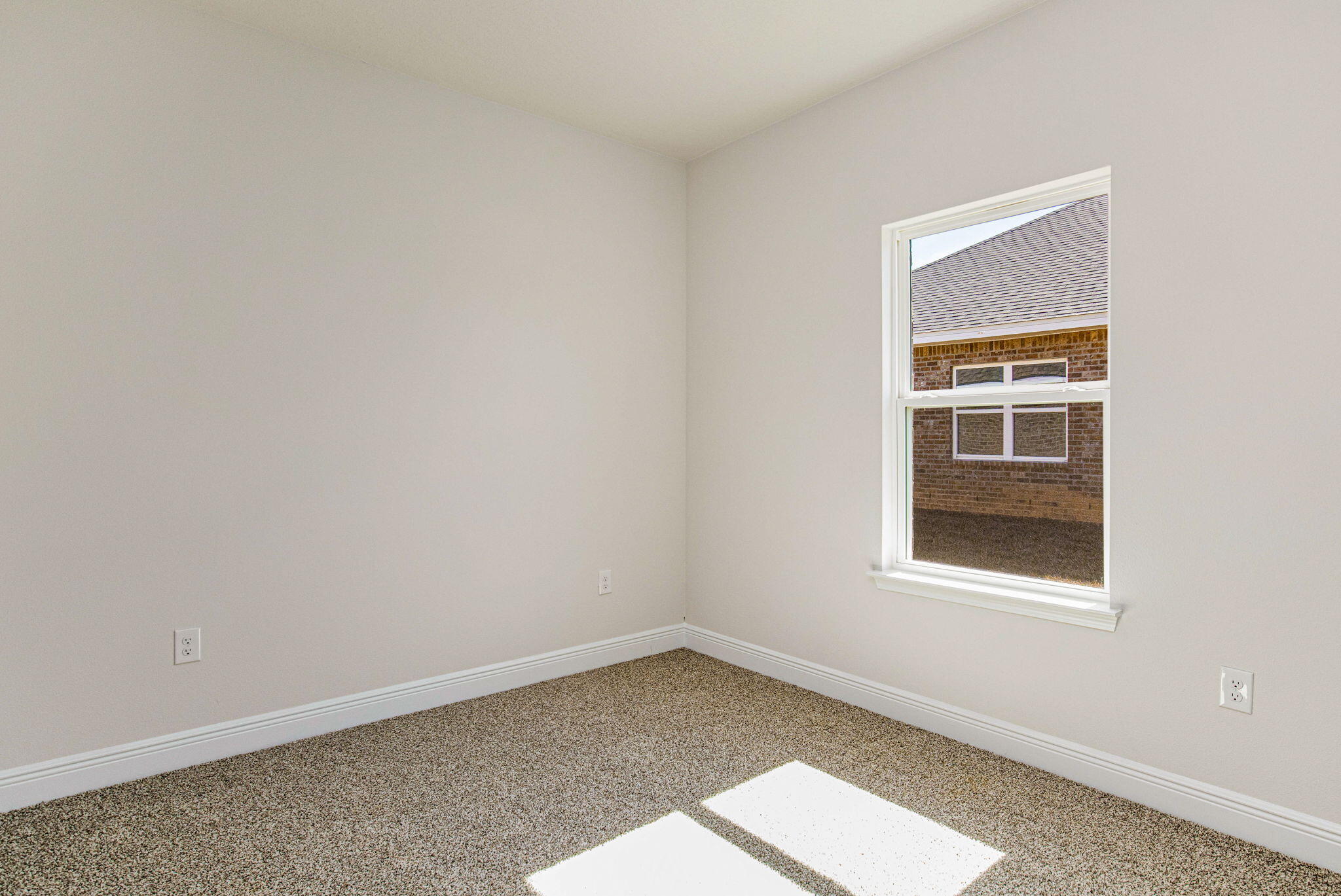 8652 Bluebell Street Milton, FL 32583 - Photo 22 of 25 an empty room with a window