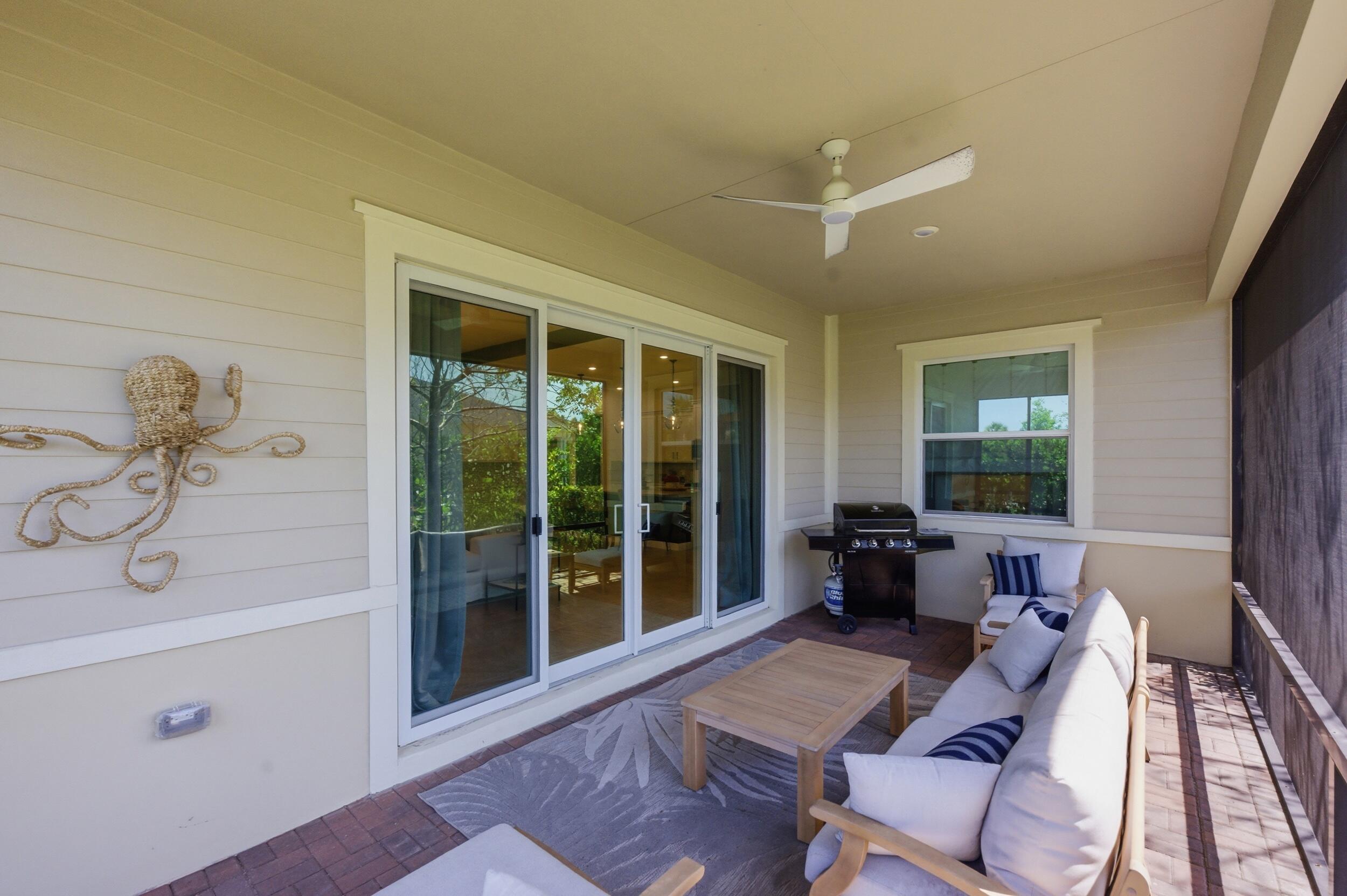 19230 Rolling Acres Road Loxahatchee, FL 33470 - Photo 22 of 58 a living room with furniture