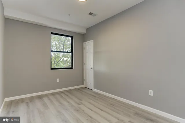 an empty room with window