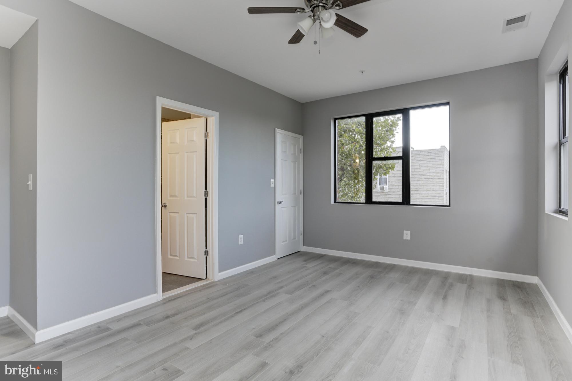 400 South Highland Avenue, Unit 301 Baltimore, MD 21224 - Photo 10 of 13 a view of an empty room with a window