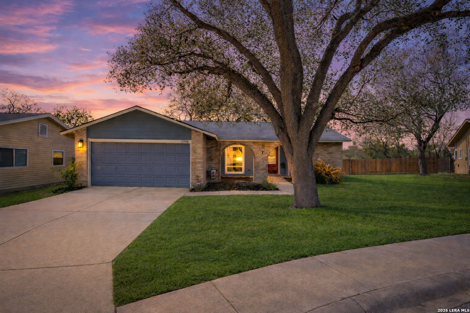 7106 Comanche Ridge Drive Converse, TX 78109 - Photo 1 of 36 a view of a yard in front of a house with large trees