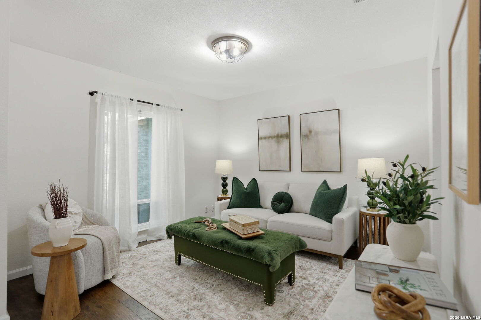 7106 Comanche Ridge Drive Converse, TX 78109 - Photo 11 of 36 a living room with furniture and a potted plant