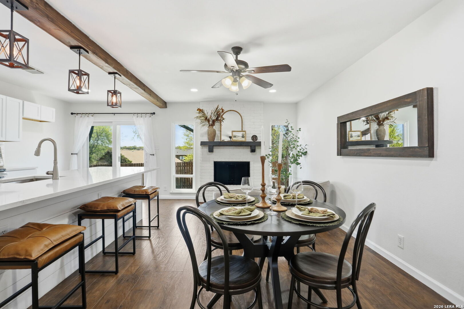 7106 Comanche Ridge Drive Converse, TX 78109 - Photo 16 of 36 a view of a dining room with furniture and a chandelier