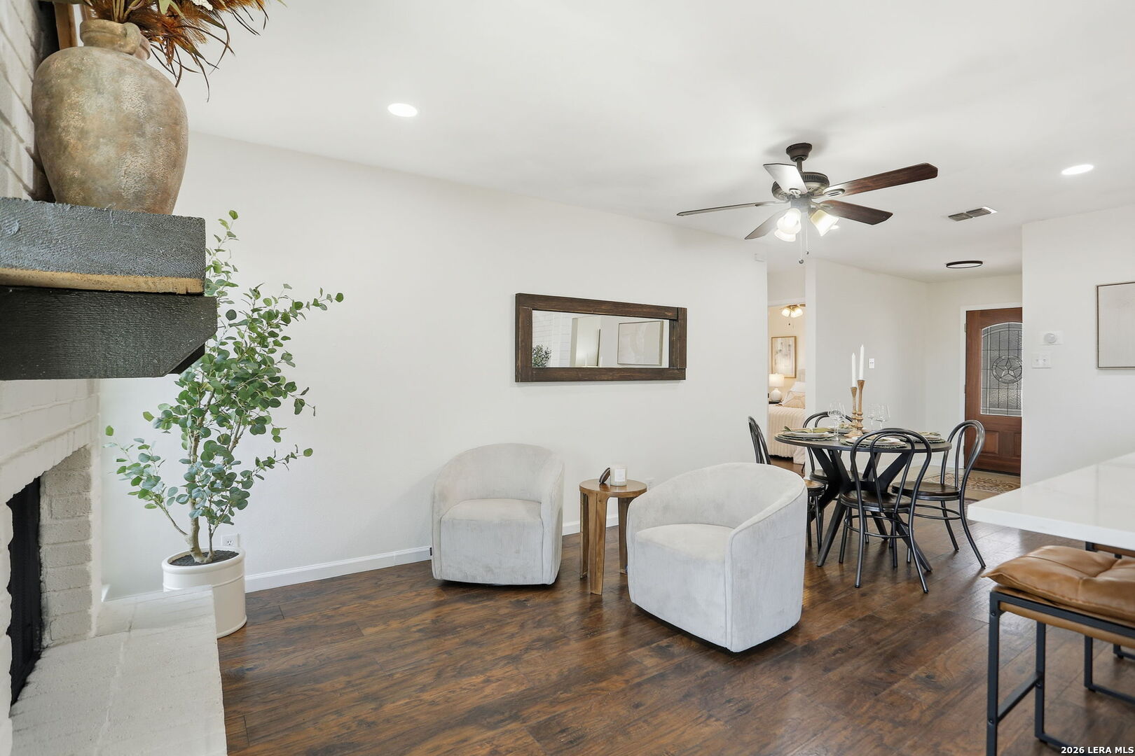 7106 Comanche Ridge Drive Converse, TX 78109 - Photo 17 of 36 a living room with furniture and a chandelier