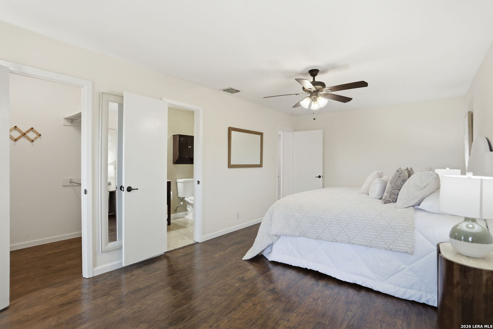 7106 Comanche Ridge Drive Converse, TX 78109 - Photo 25 of 36 a bedroom with a bed and a ceiling fan