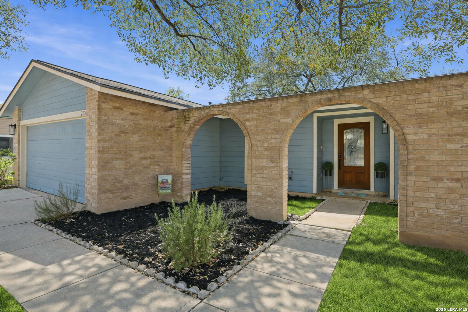 7106 Comanche Ridge Drive Converse, TX 78109 - Photo 7 of 36 a front view of a house with garden