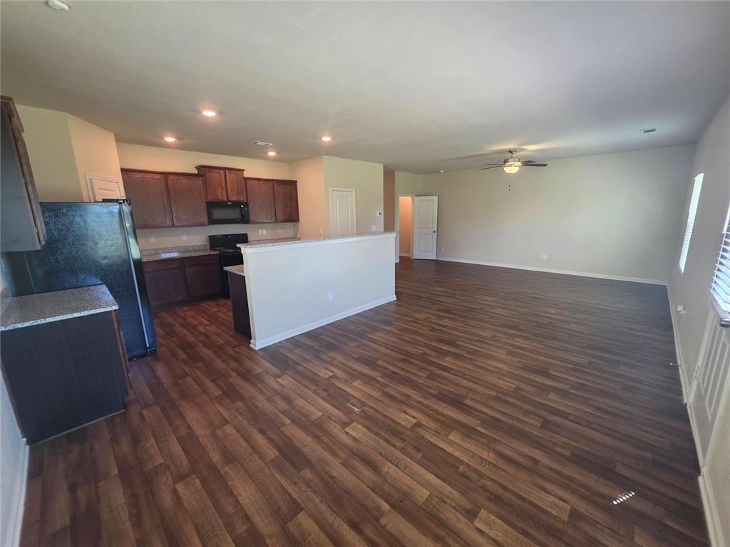 899 Independence Avenue Pendergrass, GA 30567 - Photo 5 of 16 a view of kitchen with wooden floor