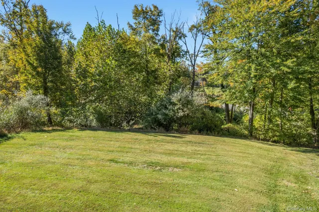 a front view of a house with swimming pool
