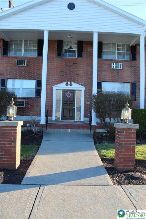 1204 Lewis Street, Unit 2E Bethlehem, PA 18017 - Photo 1 of 14 a front view of a house with garden