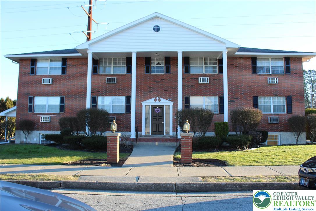 1204 Lewis Street, Unit 2E Bethlehem, PA 18017 - Photo 2 of 14 a front view of a house with garden