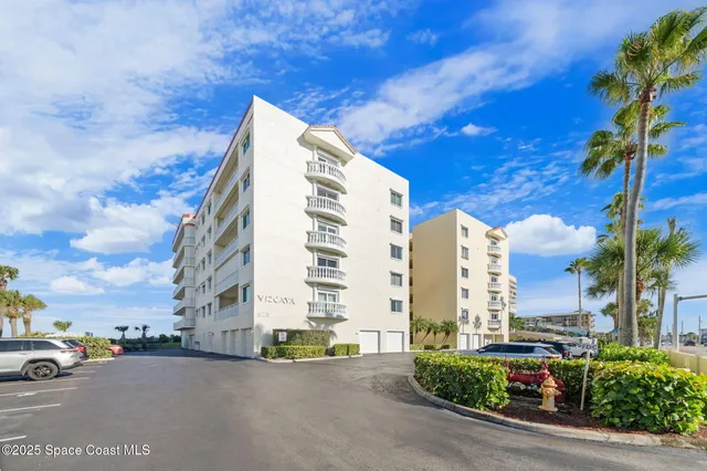 a city street lined with tall buildings