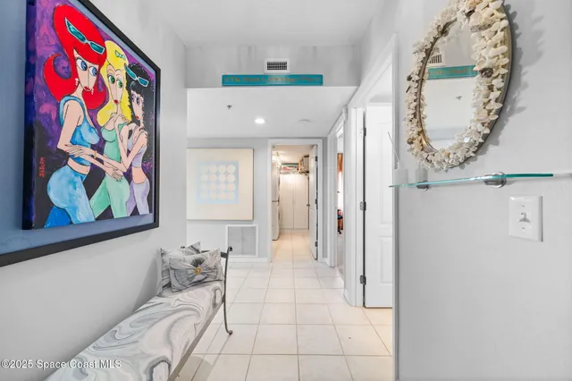a bathroom with a mirror and a shower