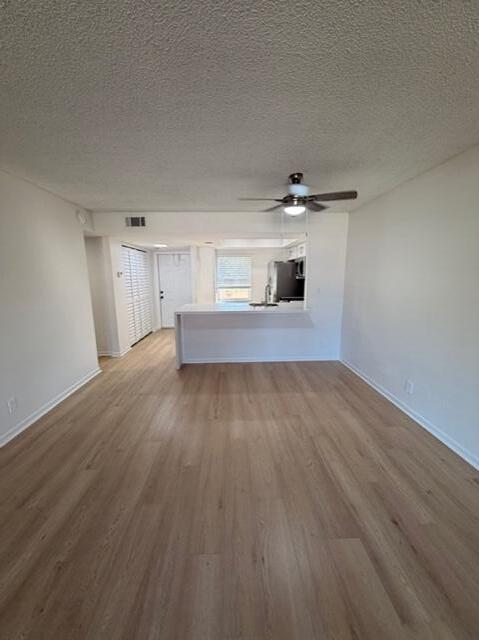 9374 Southwest 3rd Street, Unit 714 Boca Raton, FL 33428 - Photo 7 of 21 a view of a room with wooden floor