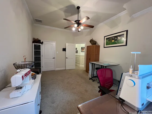 a view of a livingroom with furniture