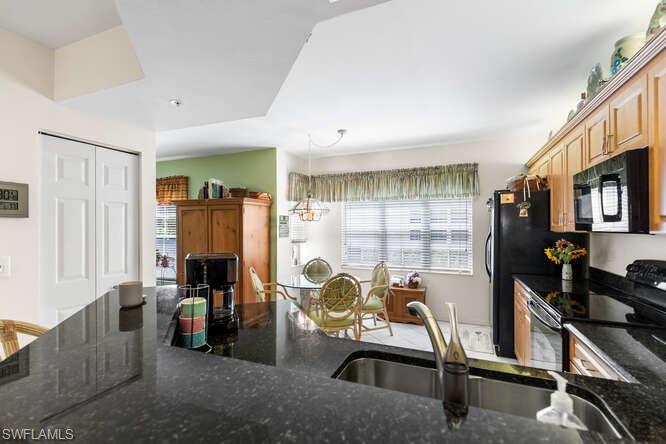 2575 Old Groves Road, Unit M101 Naples, FL 34109 - Photo 10 of 48 Gallery Image 10