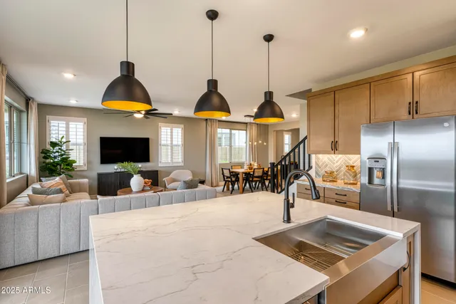 a view of living room with furniture and a flat screen tv