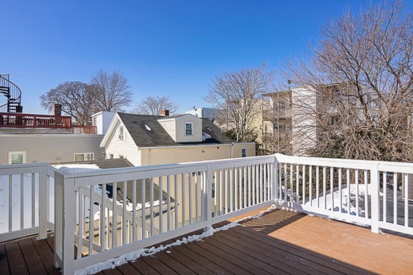 126 Princeton Street, Unit 3 Boston, MA 02128 - Photo 6 of 8 a view of a wooden roof deck