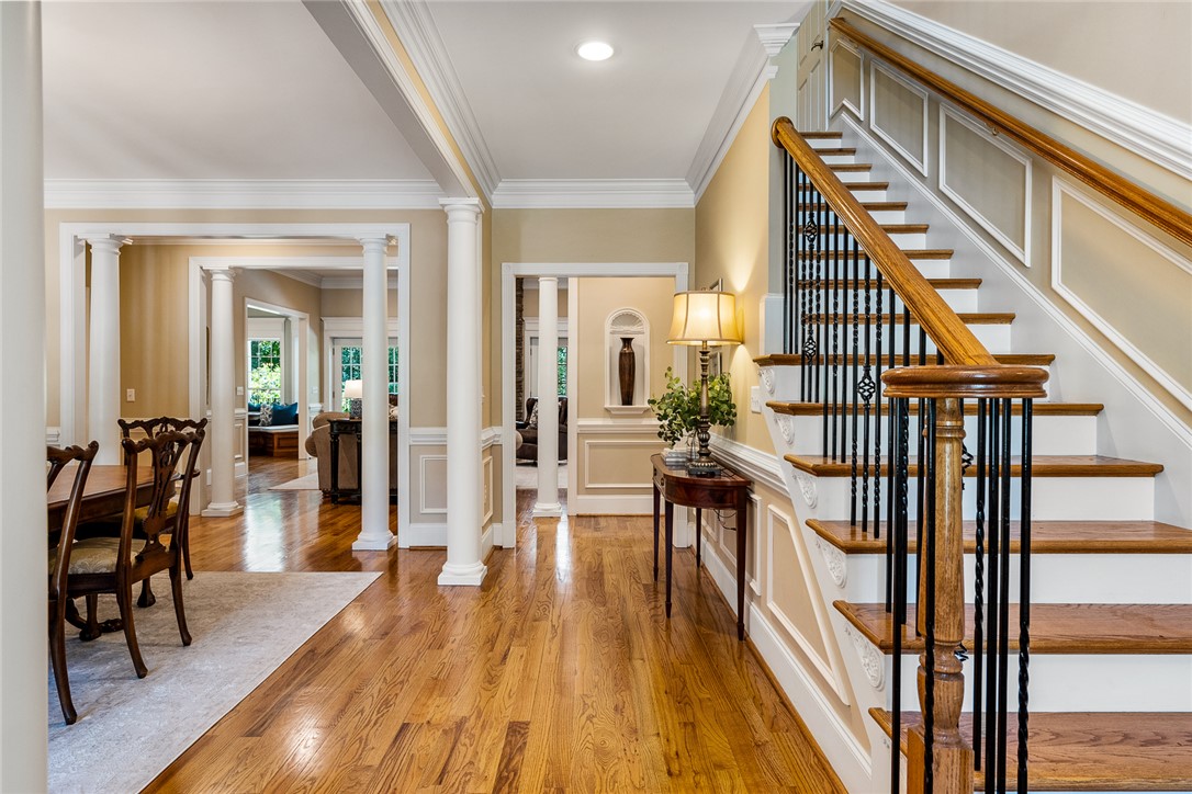 200 Graylyn Drive Anderson, SC 29621 - Photo 3 of 48 Grand entry with rich hardwood flooring and a classic staircase sets a welcoming tone.