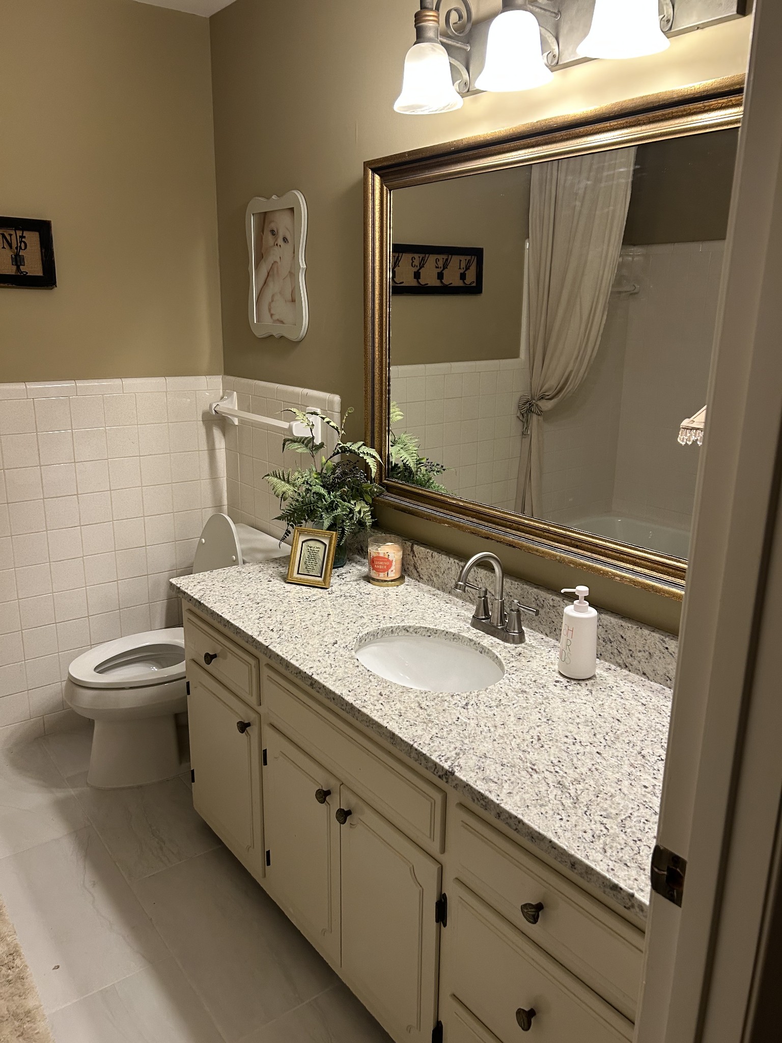 4020 Clovercroft Road Franklin, TN 37067 - Photo 39 of 63 a bathroom with a granite countertop sink and a mirror