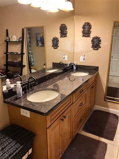 4020 Clovercroft Road Franklin, TN 37067 - Photo 50 of 63 a bathroom with a sink and a mirror