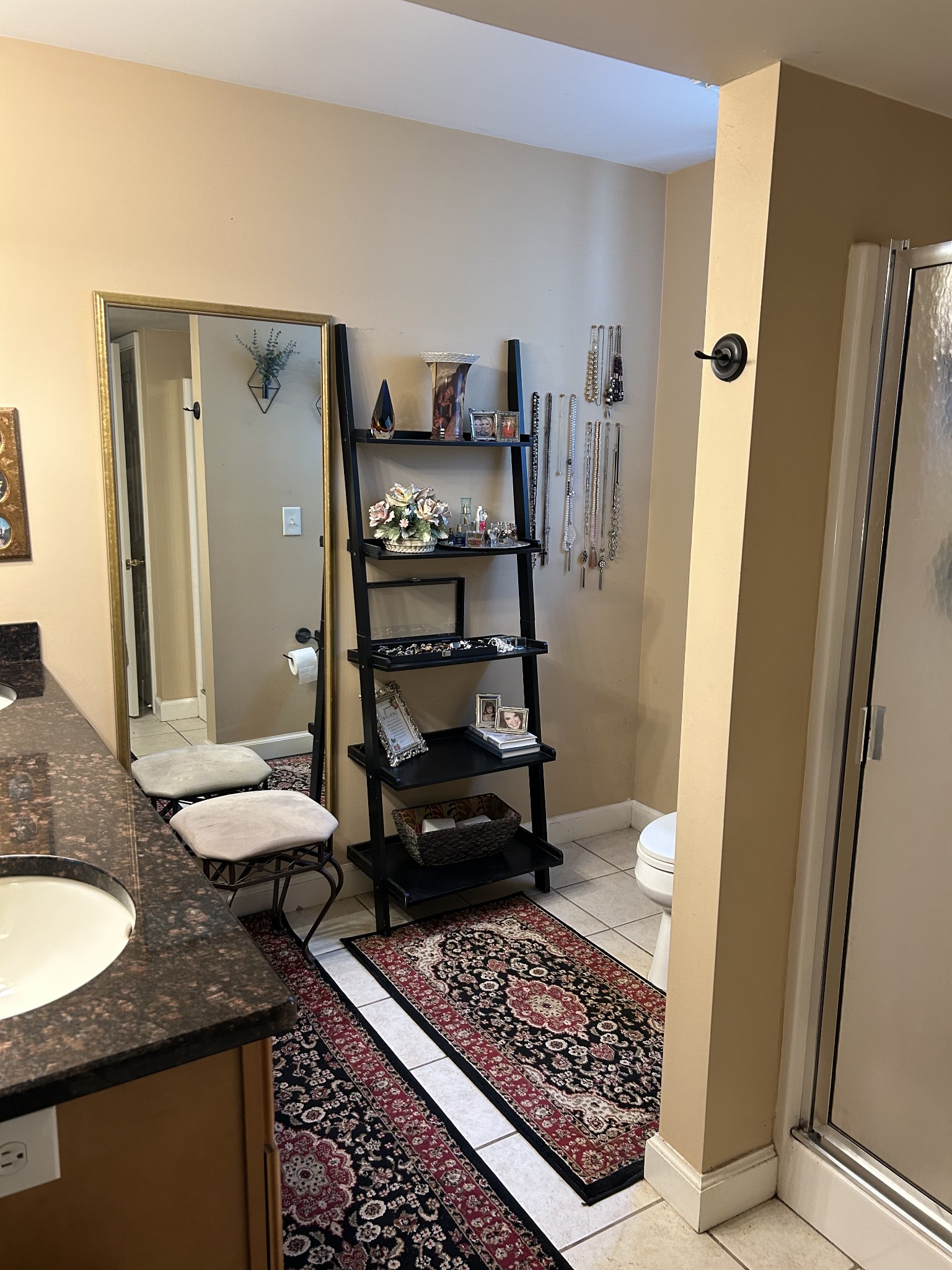 4020 Clovercroft Road Franklin, TN 37067 - Photo 52 of 63 a bathroom with a granite countertop sink and a mirror