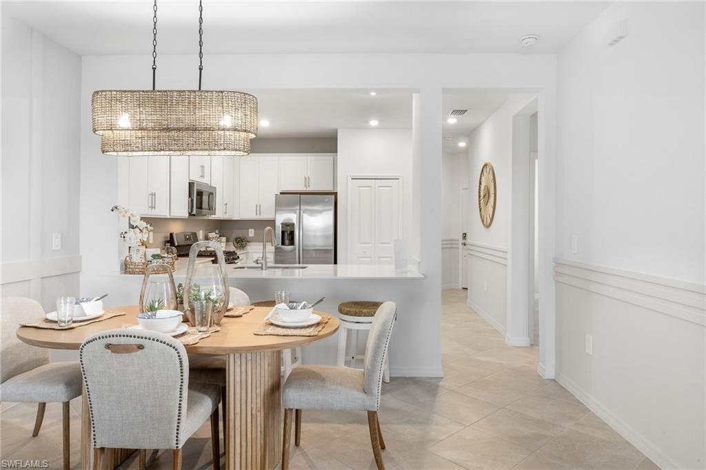 14888 Anchorage Road Punta Gorda, FL 33982 - Photo 6 of 34 Dining area featuring light tile patterned floors and recessed lighting