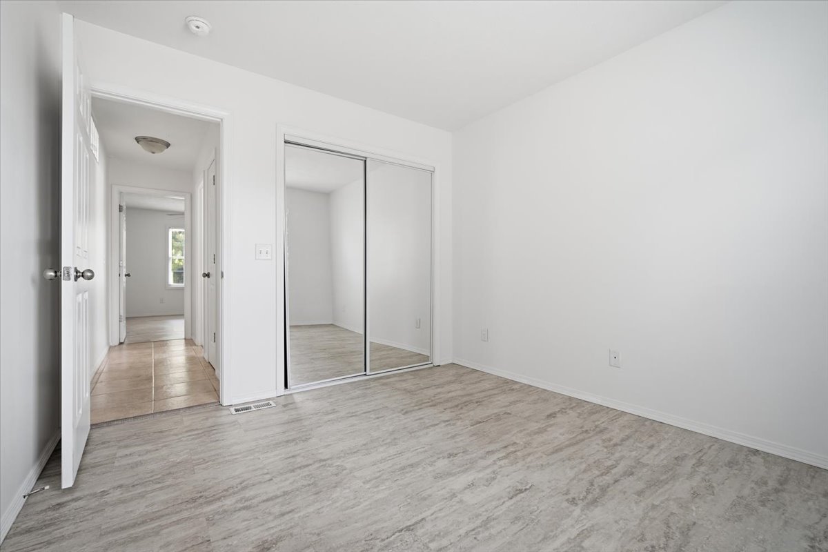 915 Teegan Street Normal, IL 61761 - Photo 17 of 33 wooden floor with white walls
