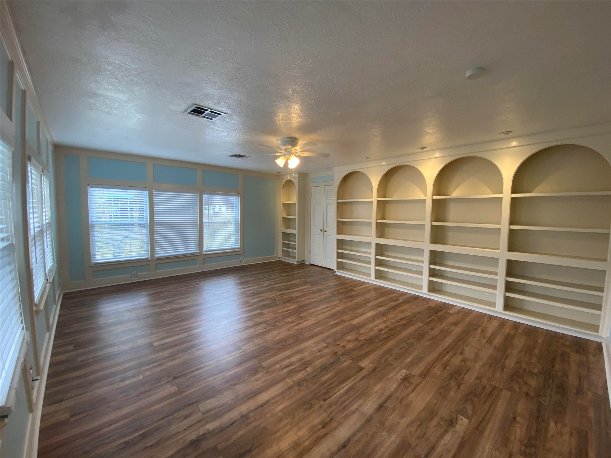 911 Hawthorne Road Clear Lake Shores, TX 77565 - Photo 15 of 50 First Floor Master Bedroom With Beautiful Built Ins And Custom Lighting