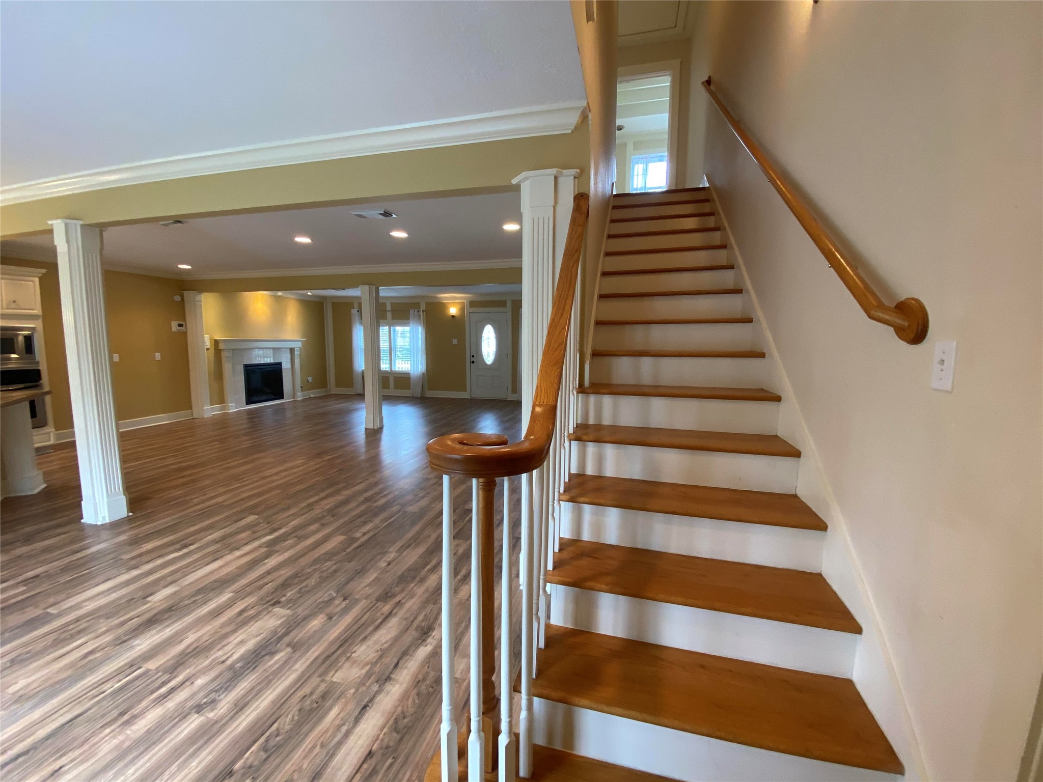 911 Hawthorne Road Clear Lake Shores, TX 77565 - Photo 25 of 50 Lovely Wood Staircase Leads To The Upstairs Master Bedroom And Master Bathroom