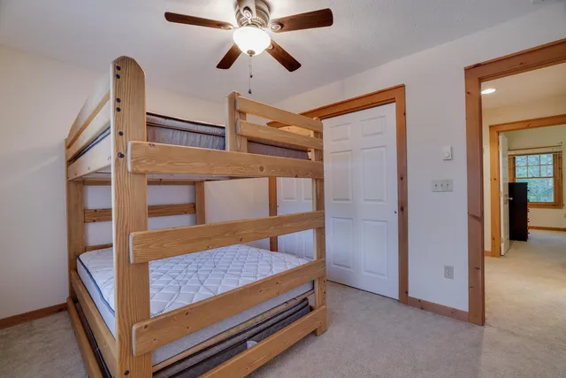 a bedroom with bunk bed