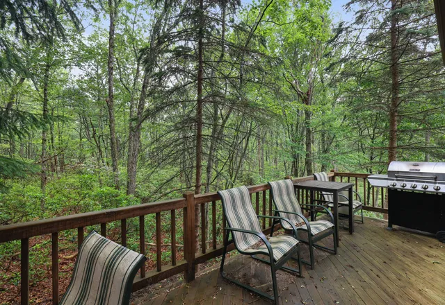 a view of a two chairs in the roof deck