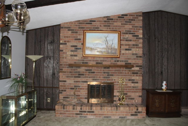 860 Riverside Drive Dixon, IL 61021 - Photo 2 of 13 a stone house with fireplace