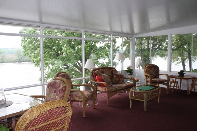 860 Riverside Drive Dixon, IL 61021 - Photo 4 of 13 a living room filled with furniture and a large window