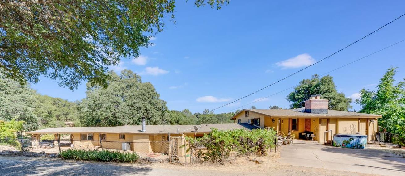 4600 El Caminito Road Shingle Springs, CA 95682 - Photo 11 of 76 a front view of a house with a yard