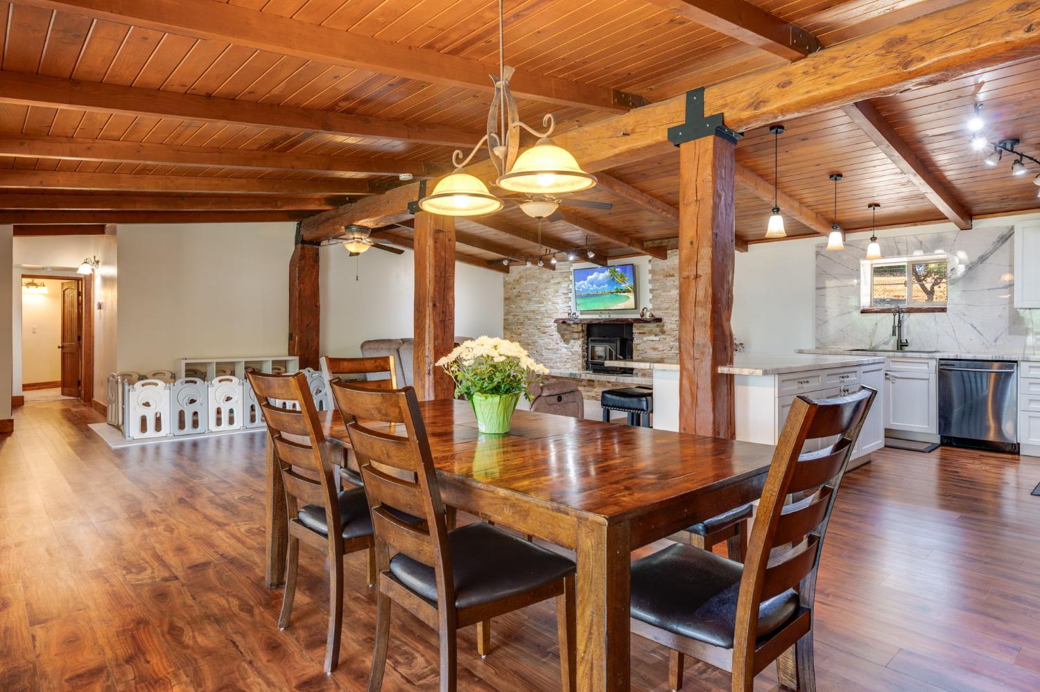 4600 El Caminito Road Shingle Springs, CA 95682 - Photo 17 of 76 a dining room with furniture and wooden floor
