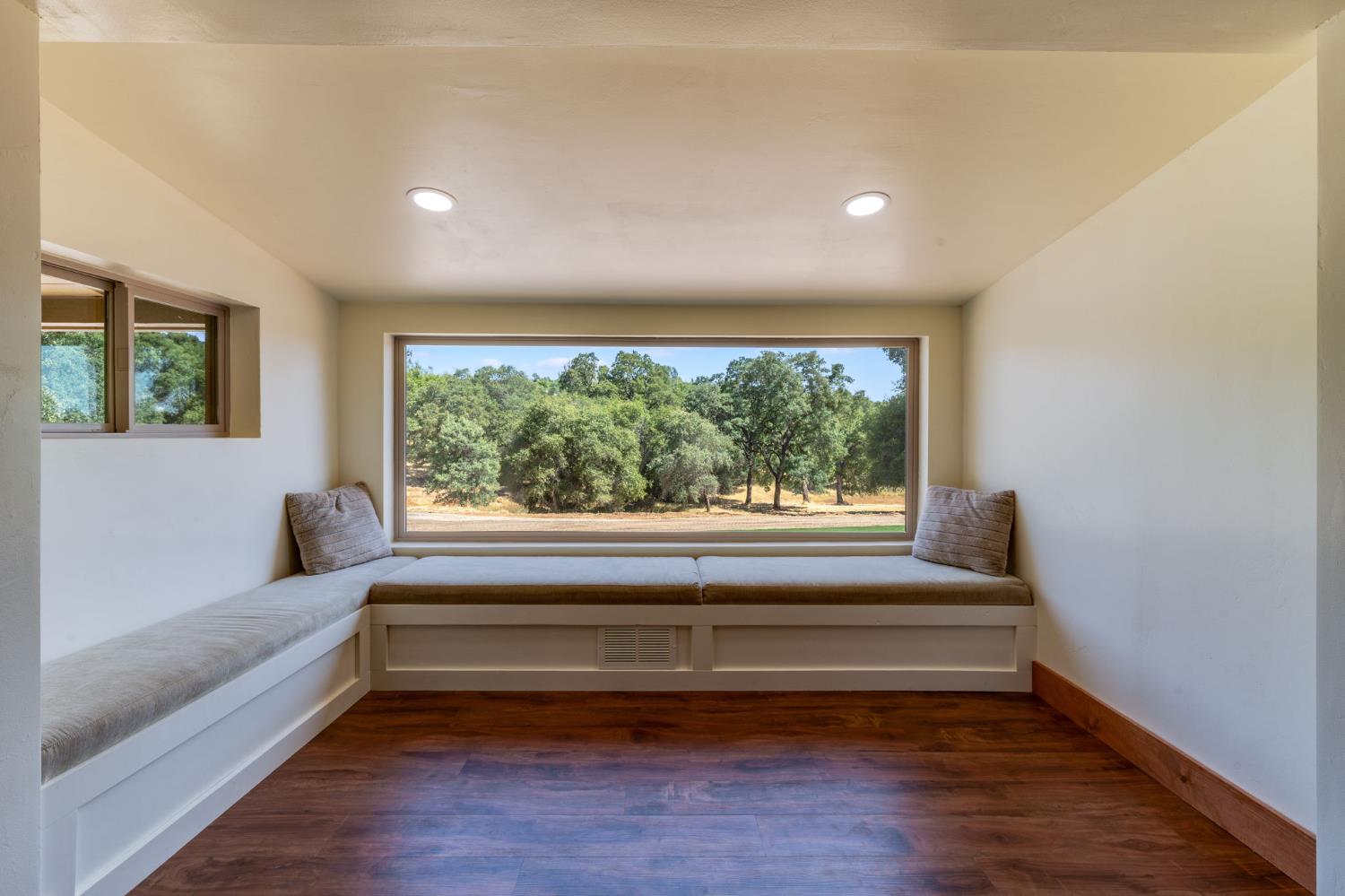 4600 El Caminito Road Shingle Springs, CA 95682 - Photo 21 of 76 a view of room with wooden floor and a window