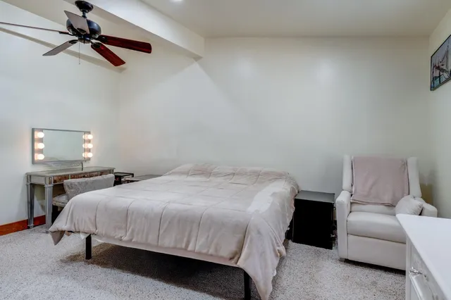 a bathroom with a shower and a sink