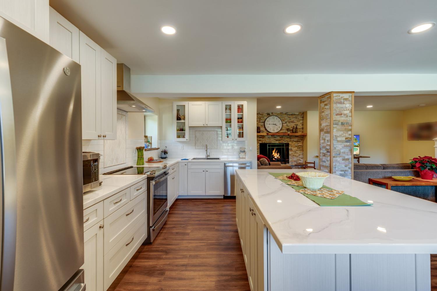 4600 El Caminito Road Shingle Springs, CA 95682 - Photo 43 of 76 a kitchen with a sink a stove and cabinets