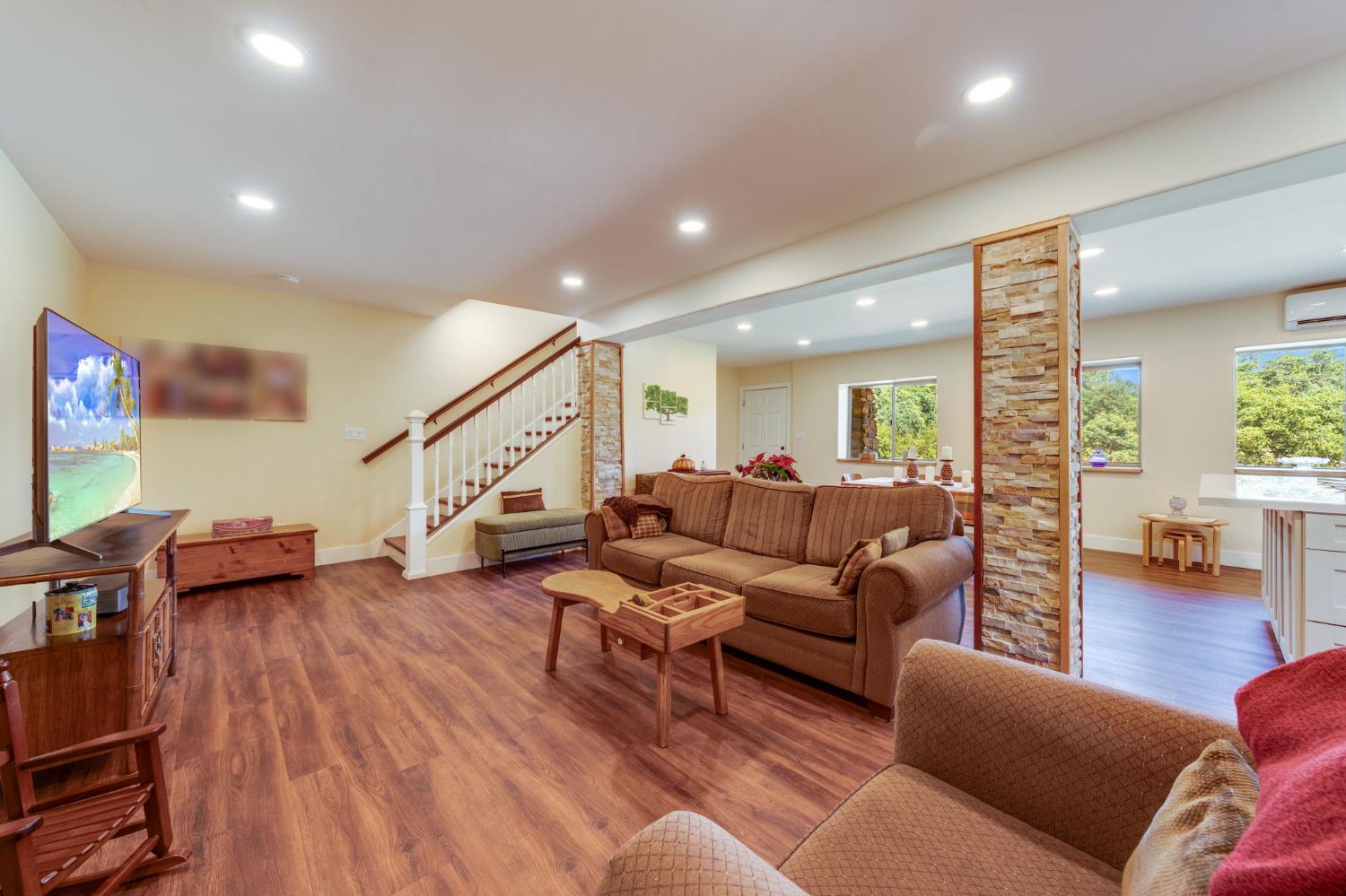 4600 El Caminito Road Shingle Springs, CA 95682 - Photo 74 of 76 a living room with furniture and a wooden floor