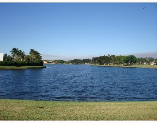 10340 Courtside Lane, Unit D Boca Raton, FL 33428 - Photo 1 of 16 Courtside Villas_1