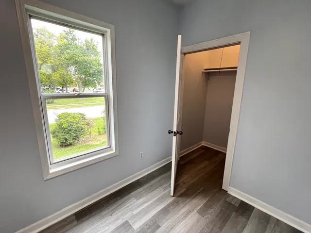 a view of an empty room and window