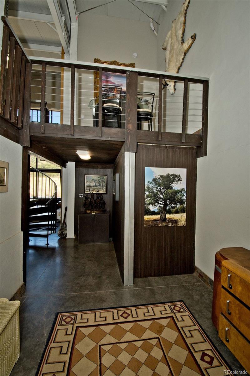 5 North Baca Grant Way Crestone, CO 81131 - Photo 19 of 42 a view of a entryway door front of a house