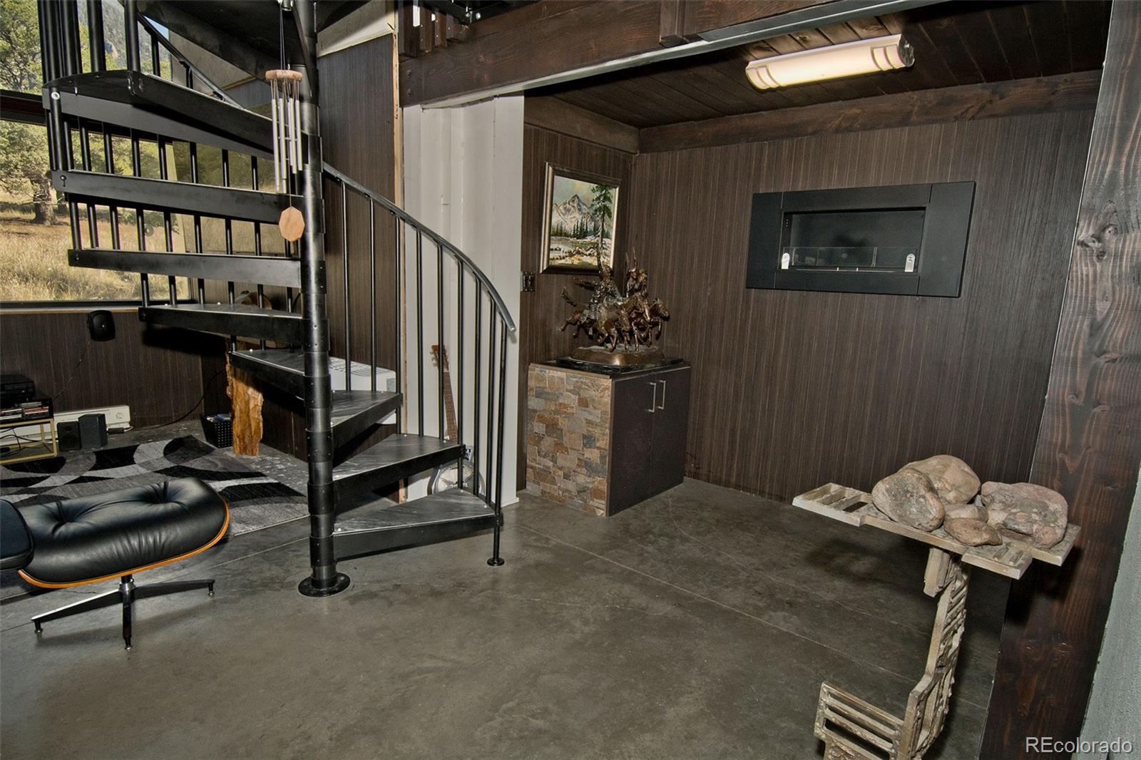 5 North Baca Grant Way Crestone, CO 81131 - Photo 21 of 42 a view of entryway wih livingroom and furniture