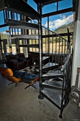 a view of a porch with wooden floor