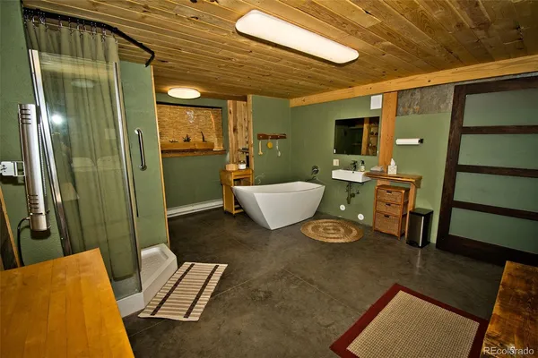 a bedroom with bed and window