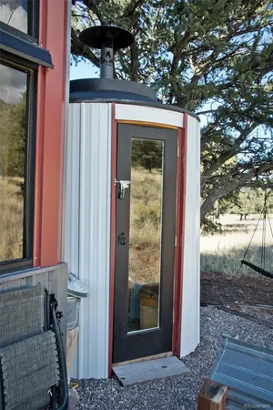 a view of a backyard of the house