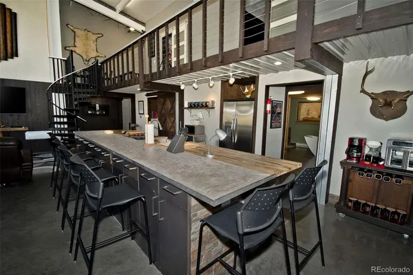 a view of a dinning table and chairs in the patio
