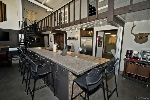 a view of a dinning table and chairs in the patio